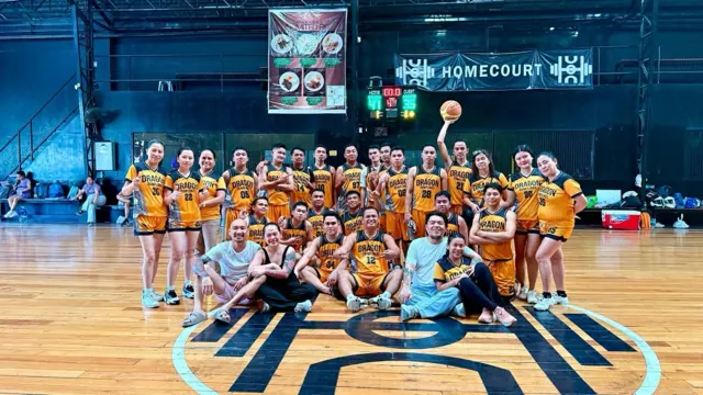 The Dragon Dumplings team in their yellow jerseys after a basketball game